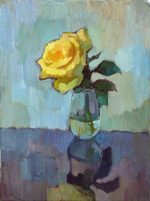 Yellow rose in glass vase
