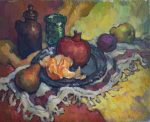 Still life with pomegranate and orange